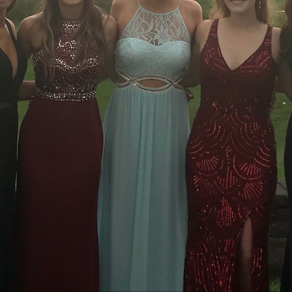 Light blue dress with silver jewels, open middle